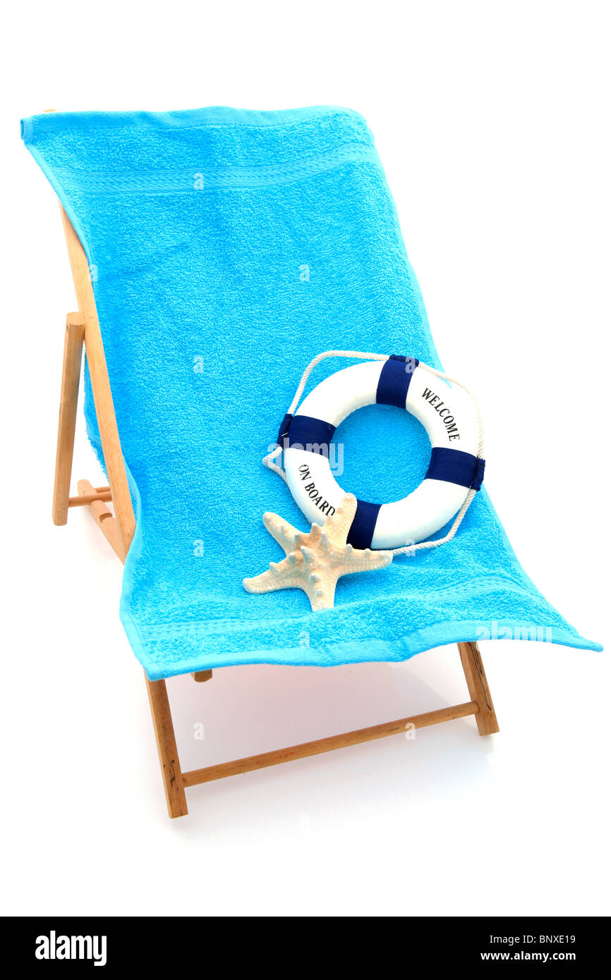 Beach Chair With Colorful Towel And Life Buoy Over White