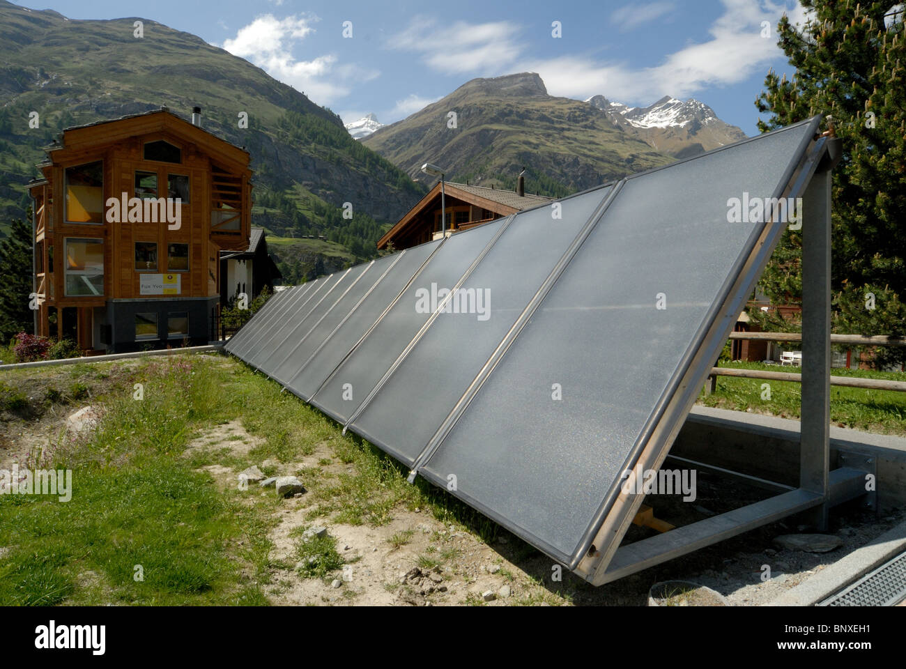 Solar Hot water panels supply hot water to a guest house in Zermatt, Switzerland Stock Photo