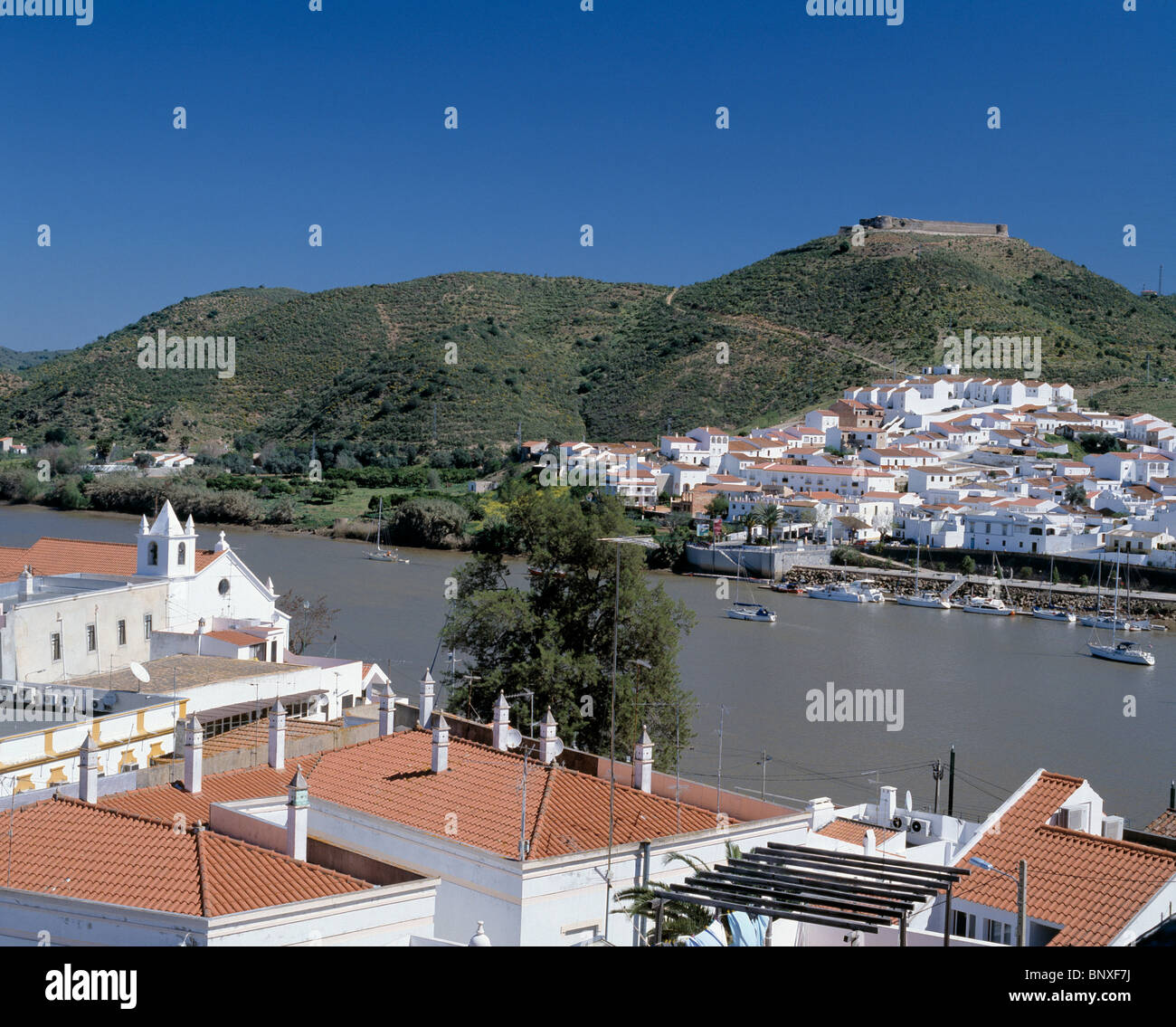 Alcoutim, the Algarve, Portugal. The view over the Guadiana river towards Sanlucar de Guadiana in Spain Stock Photo