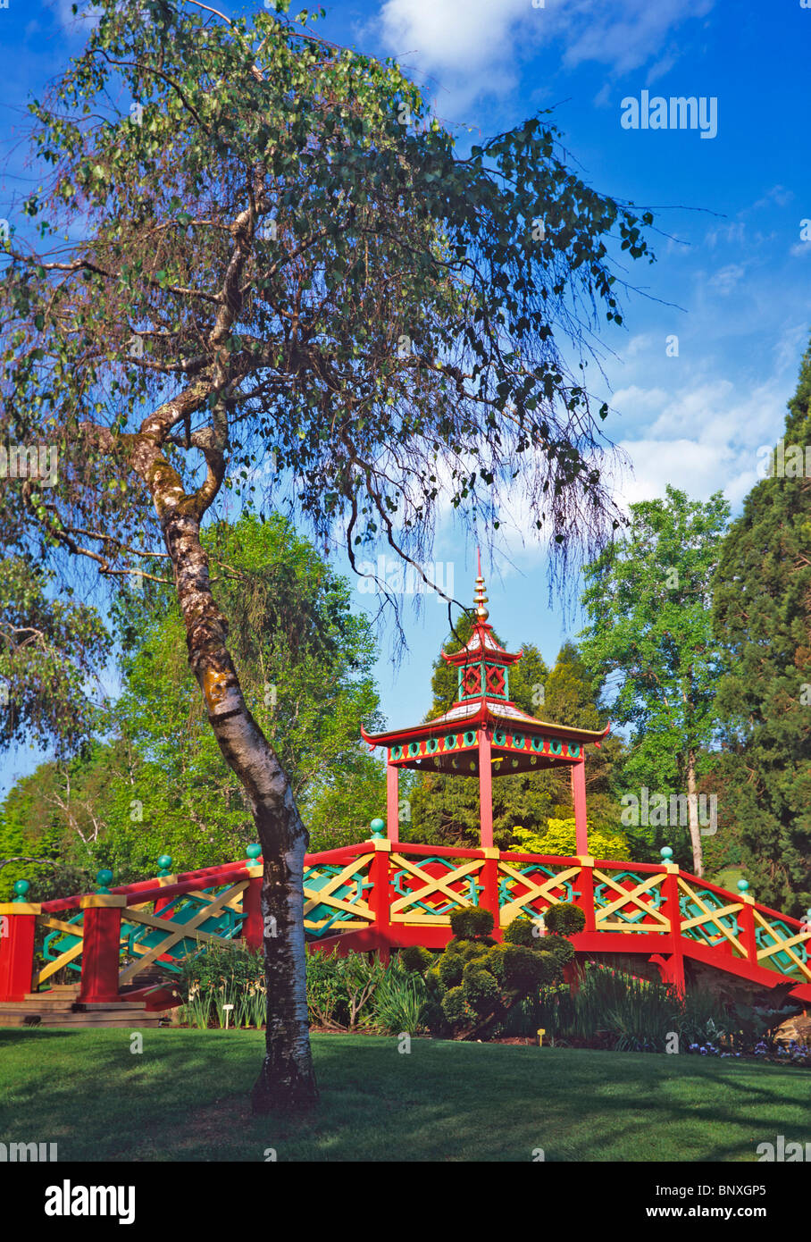 The Chinese Bridge in the parkland over the lake at Parc floral d