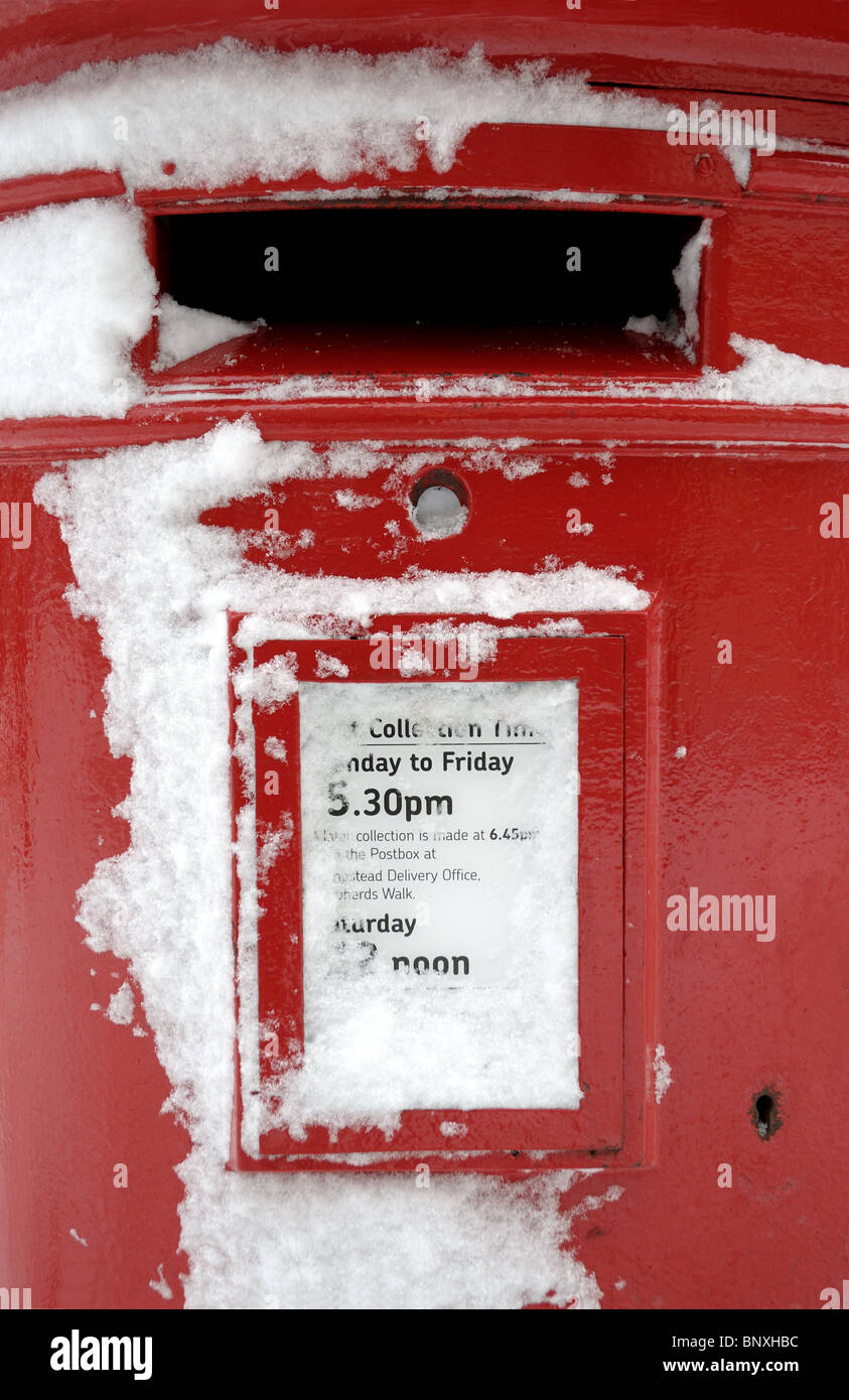 Snow Covered Post Box In Belsize Park London Stock Photo
