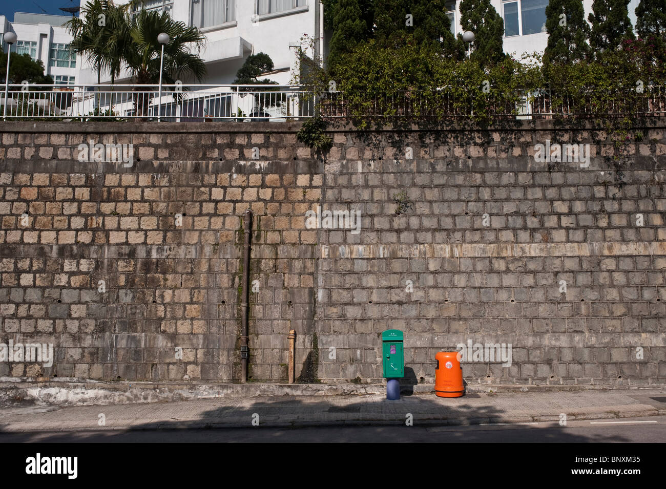 Typical Hong Kong brightly colored street furniture Stock Photo Alamy