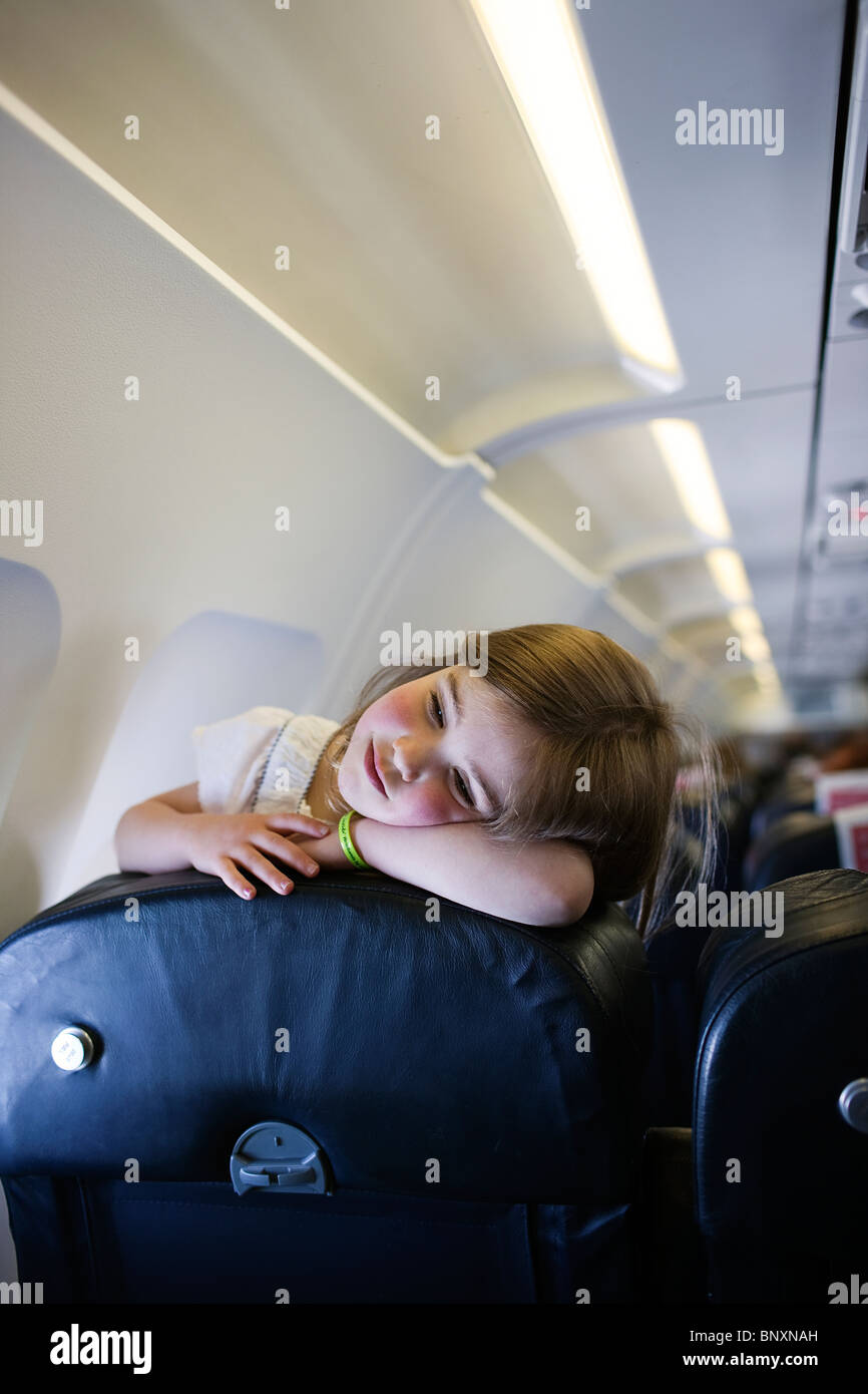 Child traveling on a plane Stock Photo Alamy