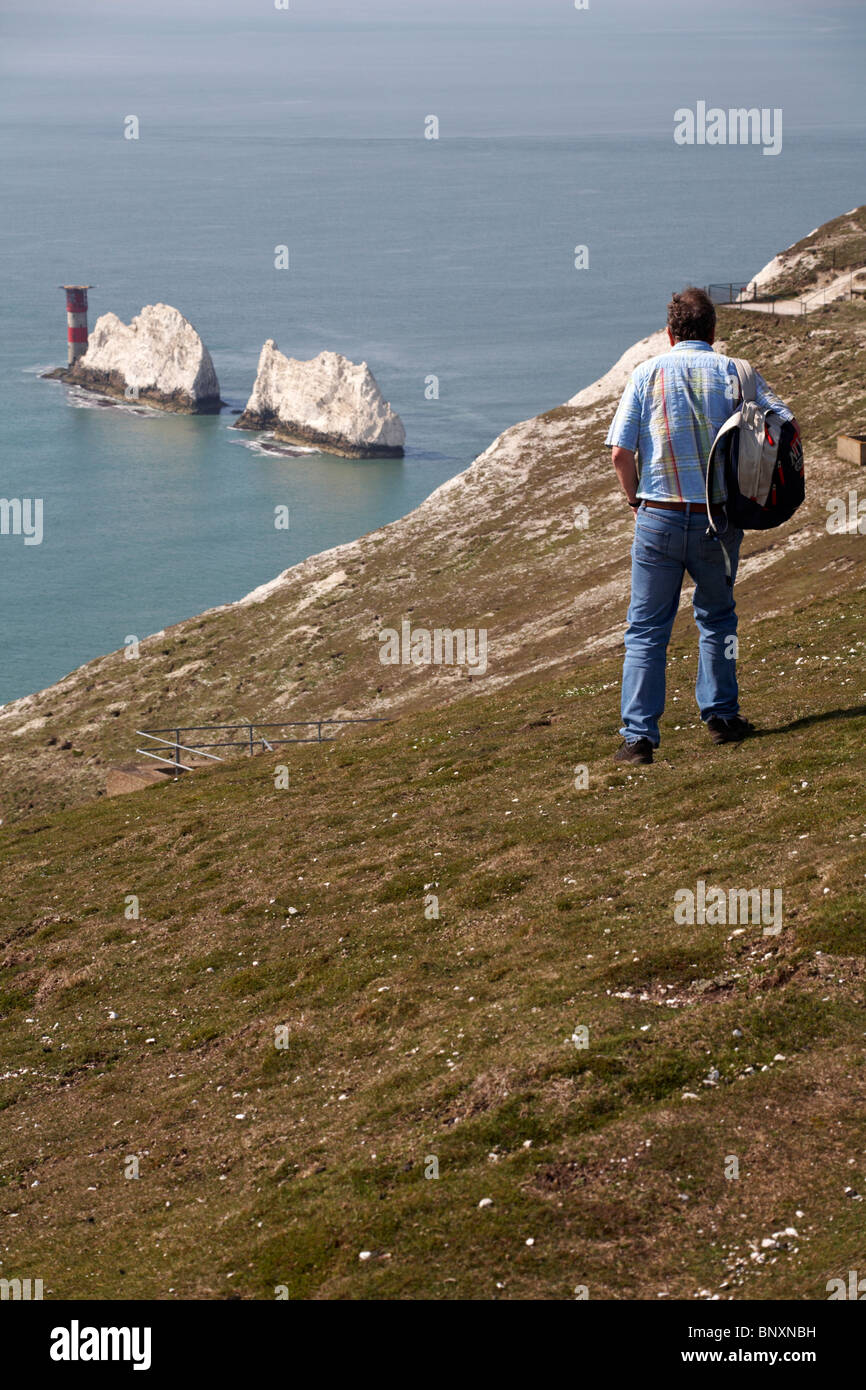 Man walking towards the Needles on the Isle of Wight, Hampshire ...