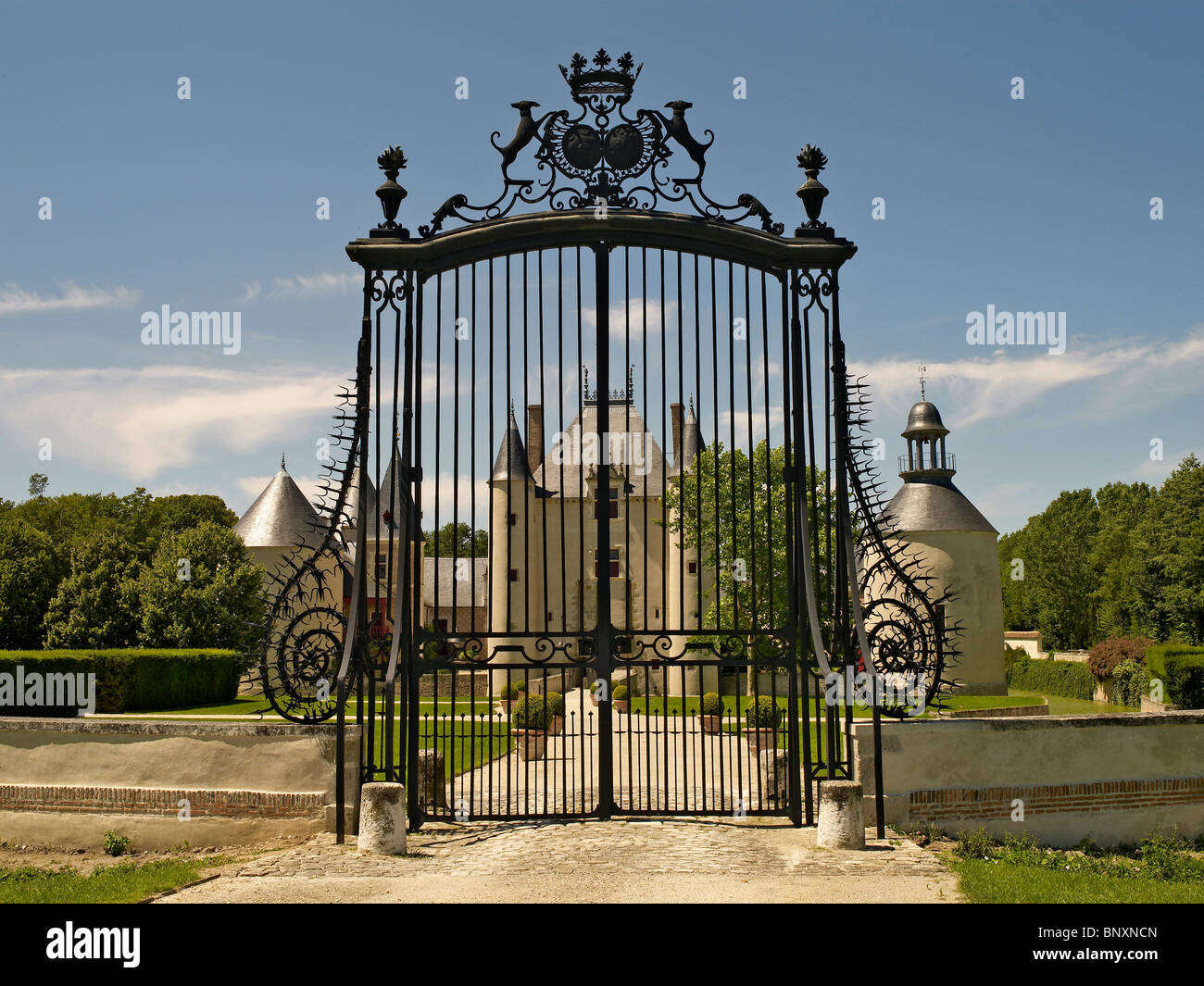 A view of the impressive Gates at the original enterance to the Chateau at Chamerolles Stock Photo