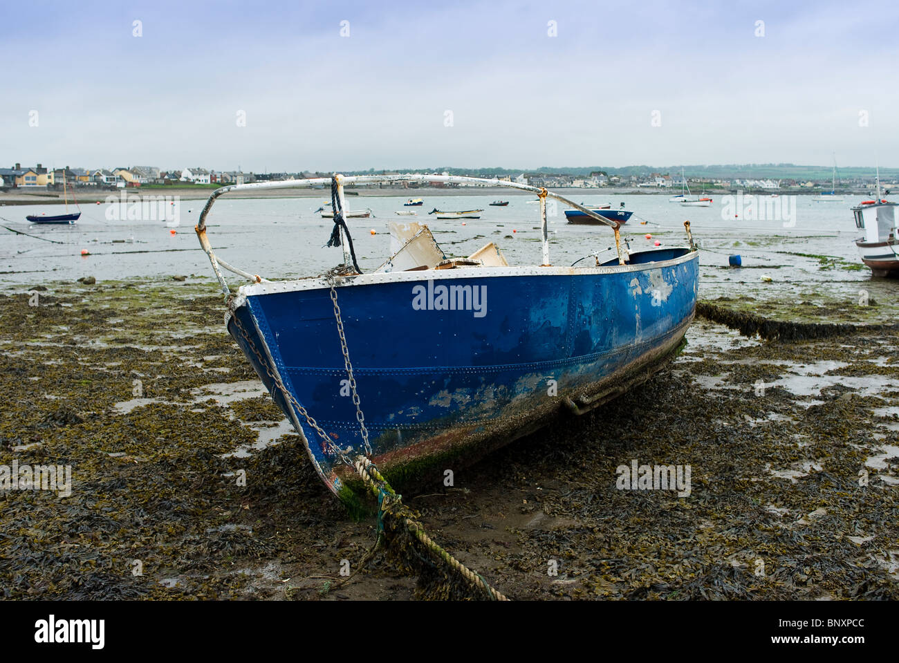 A wrecked yacht in the harbour of the seaside town of Skerries, north county Dublin, Ireland Stock Photo