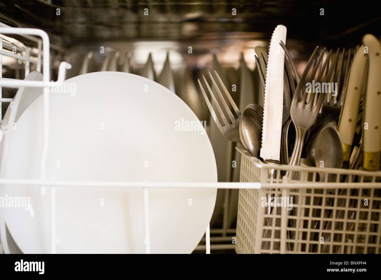 Loaded dishwasher Stock Photo