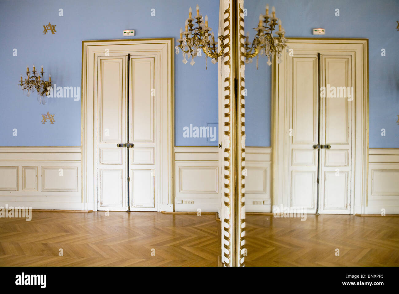 Mirrored wall of room in historic building Stock Photo