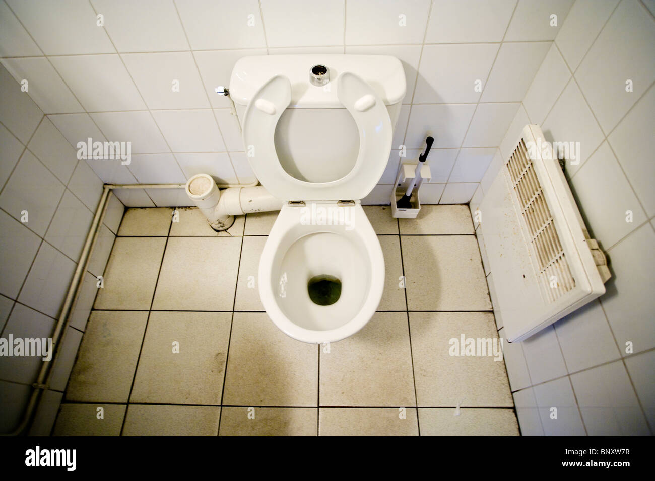Toilet with seat raised Stock Photo