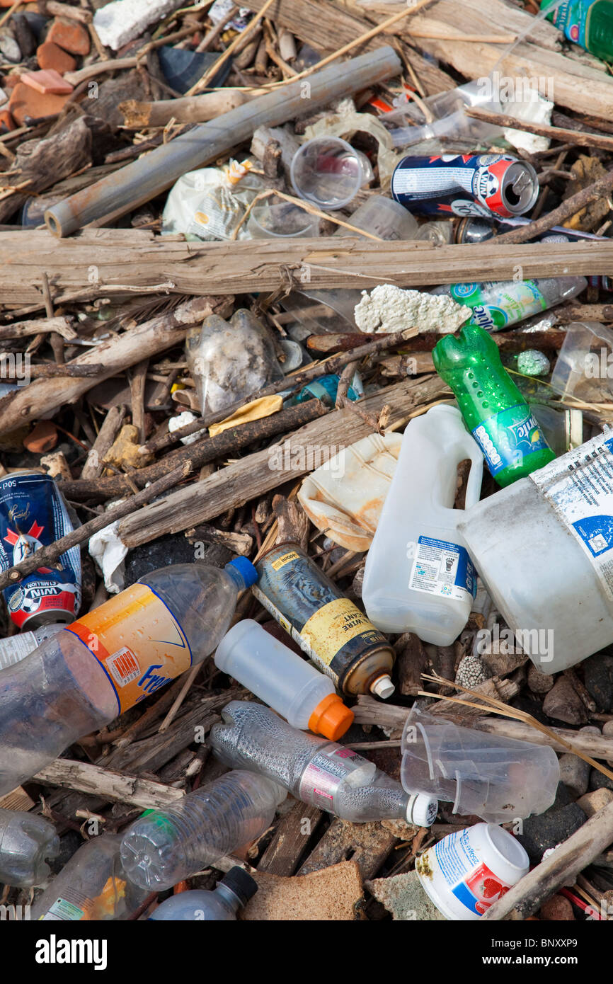 Flotsam and jetsam rubbish collected on Thames side beach at high water