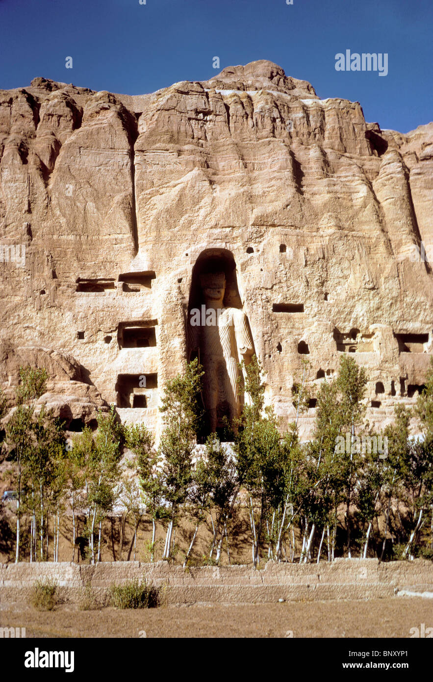 A 1974 image of the ancient standing Buddha now destroyed by the Taliban, Bamiyan, Afghanistan Stock Photo