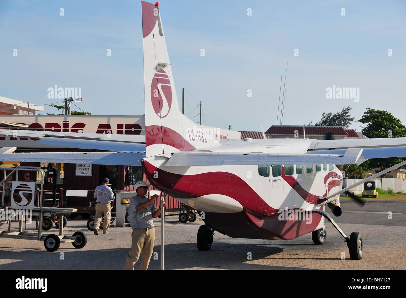 An small "Island hopper" plane lands at the tiny San Pedro airport on