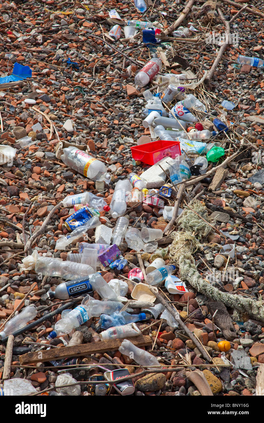 Flotsam and jetsam rubbish collected on Thames side beach at high Stock