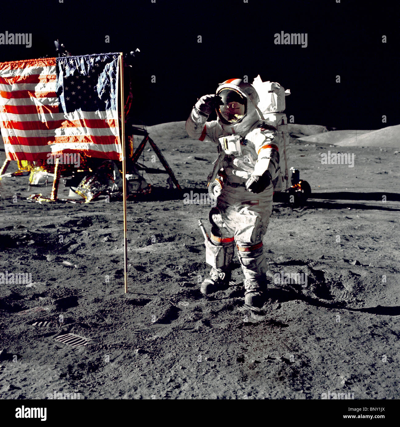 Eugene A. Cernan, Commander, Apollo 17 salutes the flag on the lunar surface Stock Photo