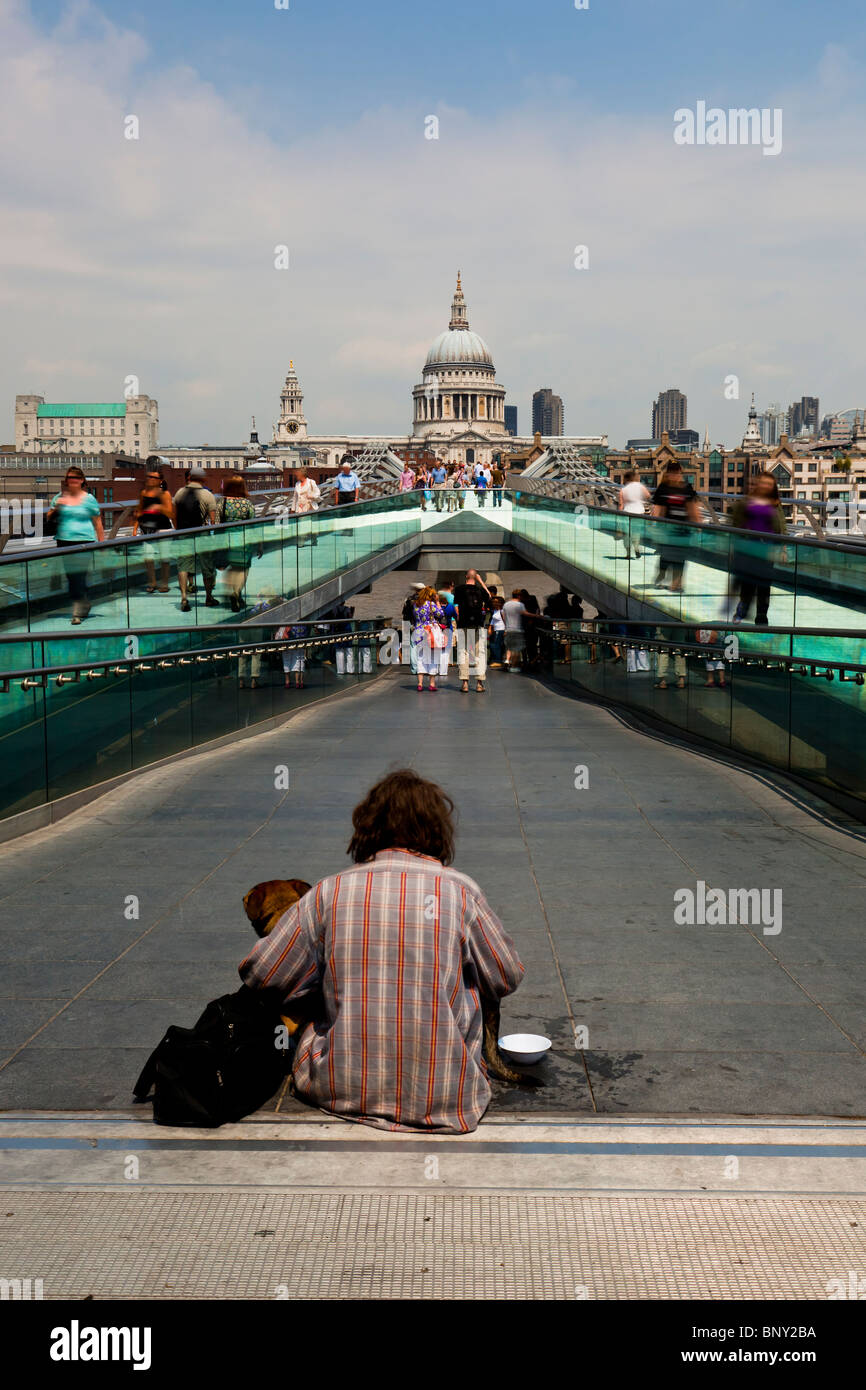 Poor Man on Millenium Bridge London Stock Photo