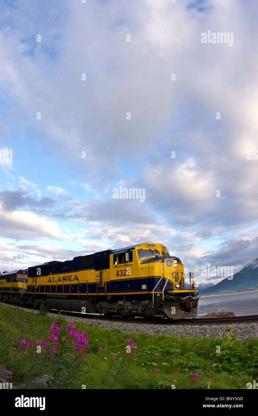 Alaska Railroad train riding along Turnagain Arm in Alaska Stock Photo