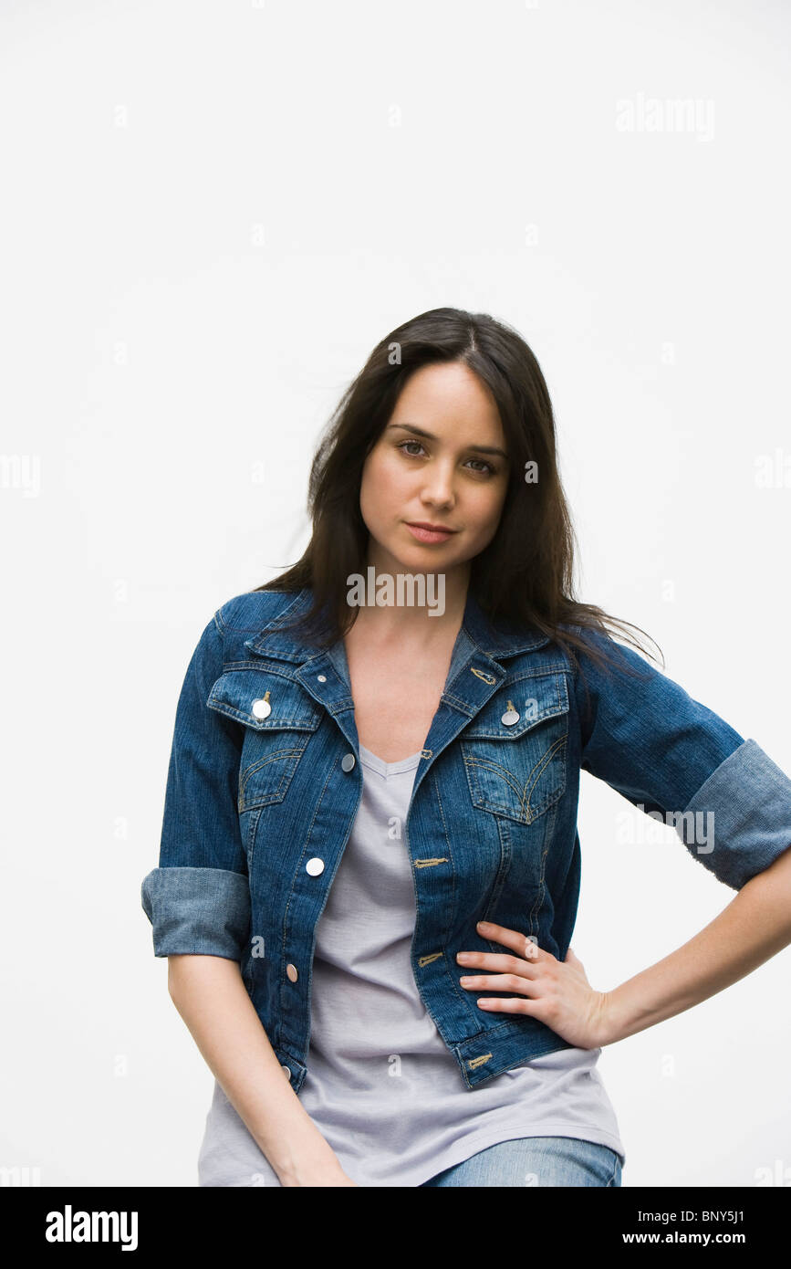 Woman wearing jean jacket, portrait Stock Photo