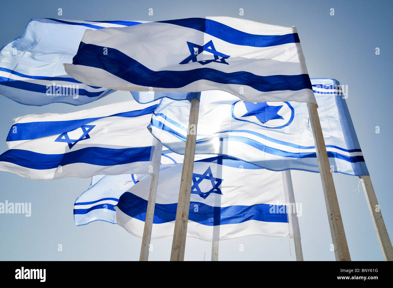 Israeli and Israeli Air force Flags on blue sky background Stock Photo
