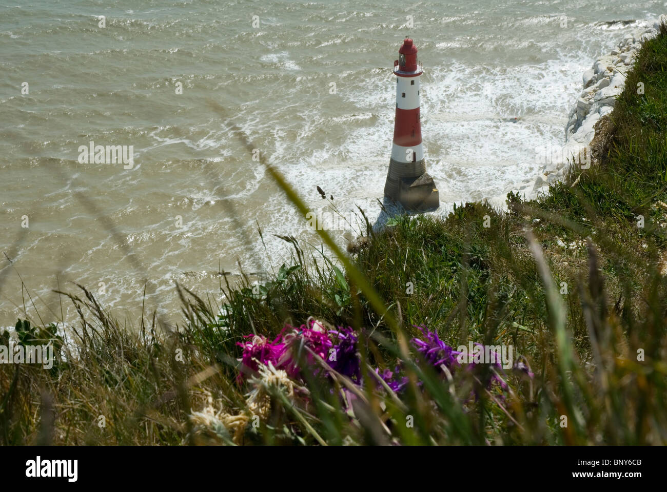 Beachy Head Lighthouse, flowers left by relatives for a suicide victim. Stock Photo