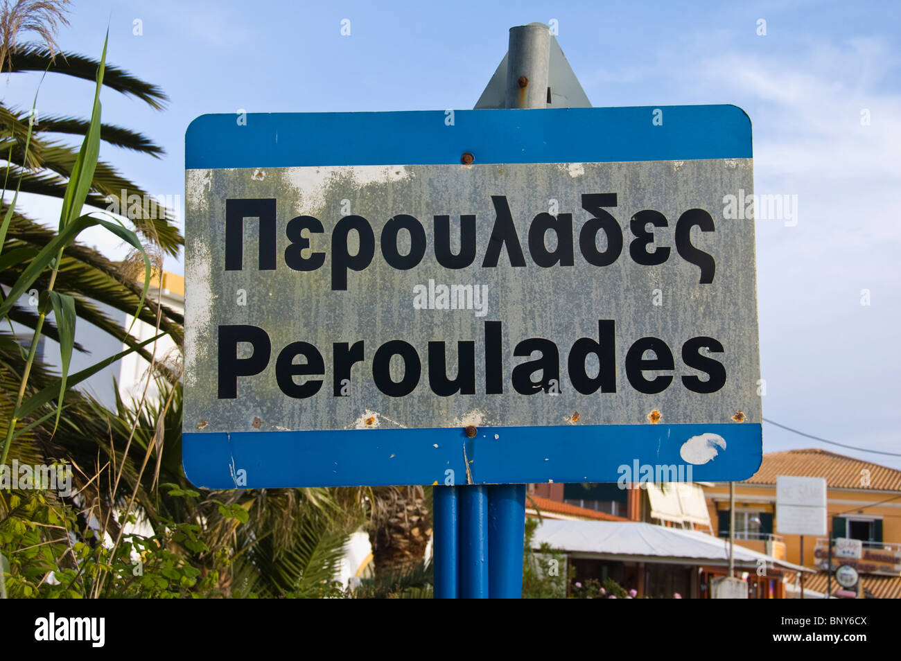 Bilingual Greek English language sign outside village of Peroulades on the Greek island of Corfu Greece GR Stock Photo