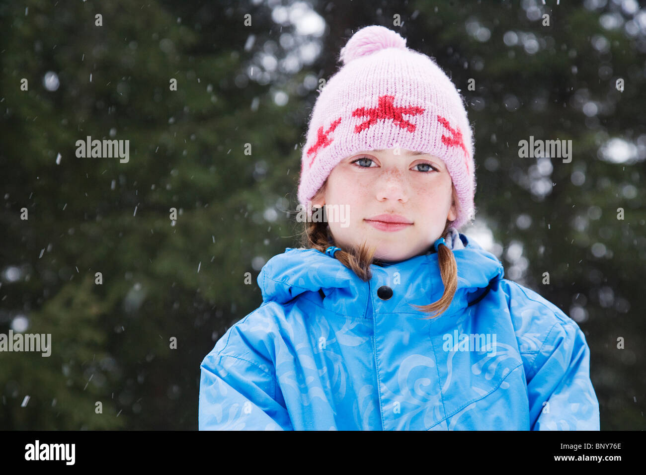 Girl with wooly hat smiling Stock Photo