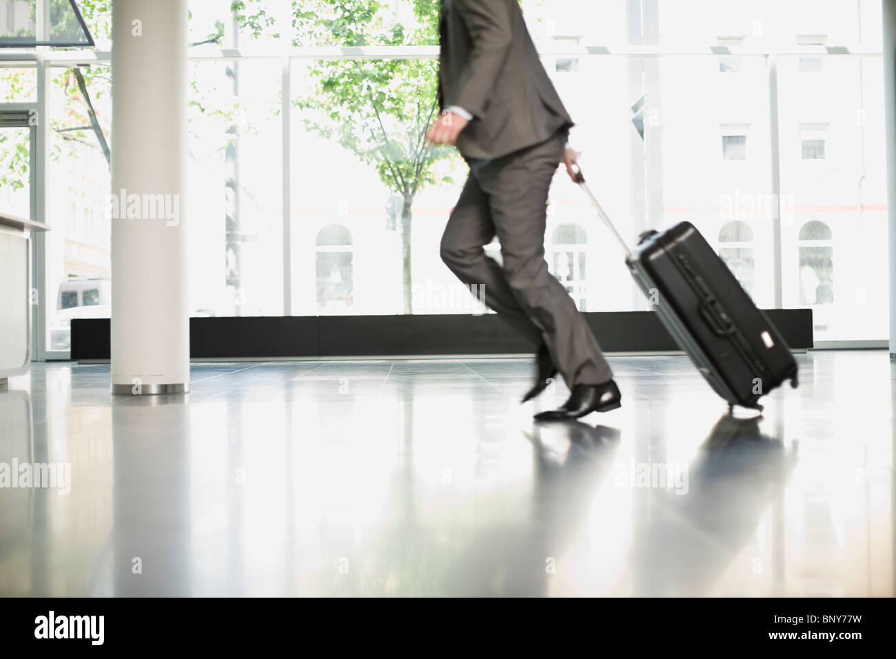 Man trying to catch his flight Stock Photo Alamy