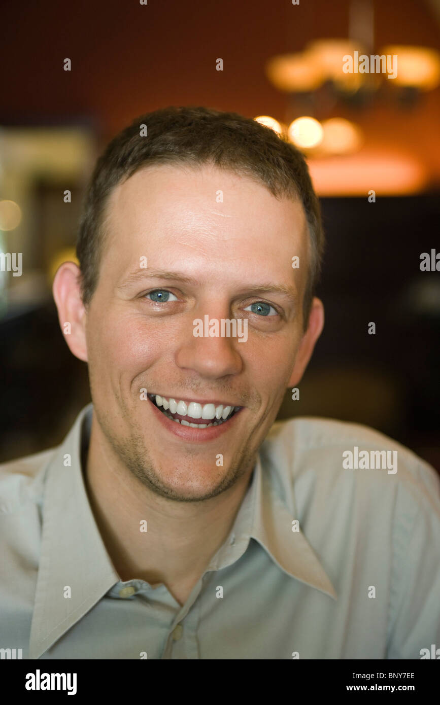 Smiling happy adult man hi-res stock photography and images - Alamy