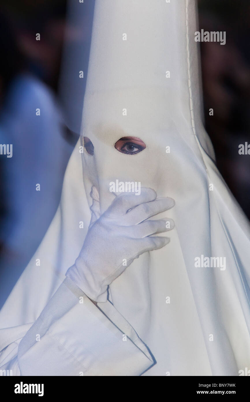 Penitents wearing hooded robes during Semana Santa, (Holy Week ...