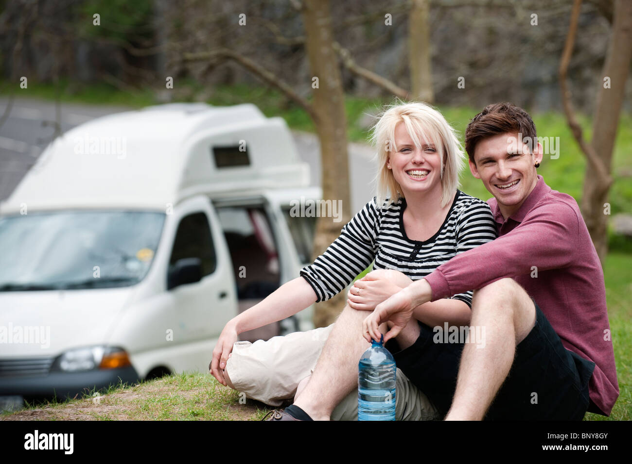 Portrait happy young couple trip camper van hi-res stock photography ...