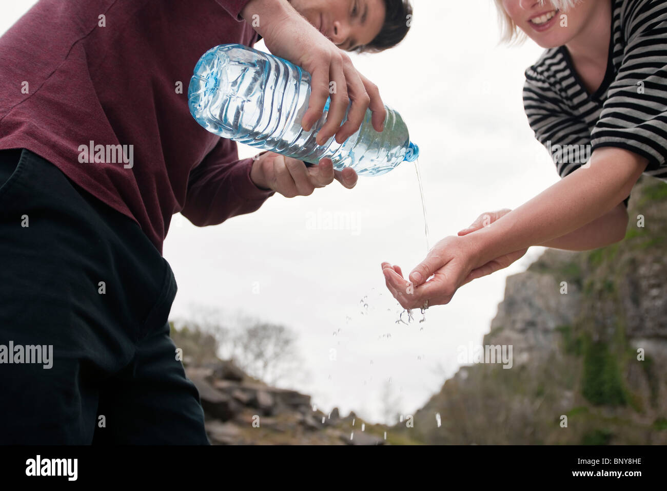 Water pouring onto hand hires stock photography and images Alamy
