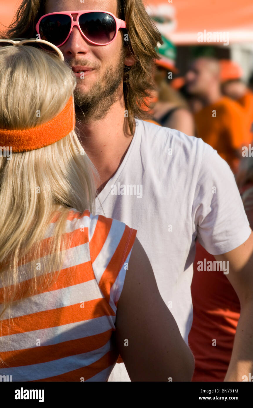 A young couple at the Museumplein in Amsterdam, the Netherlands Stock Photo