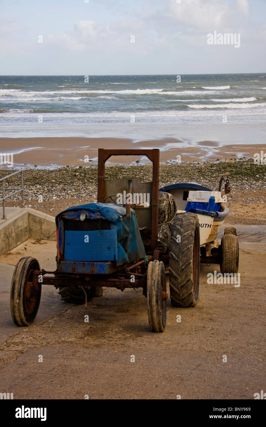 Tractor and boat Stock Photo