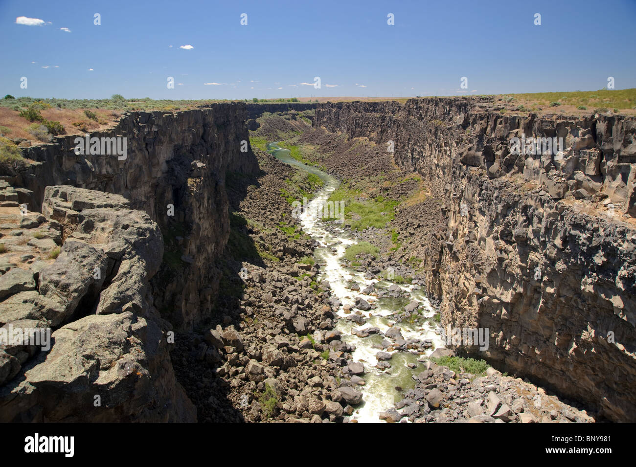 River flowing through deep gorge Stock Photo