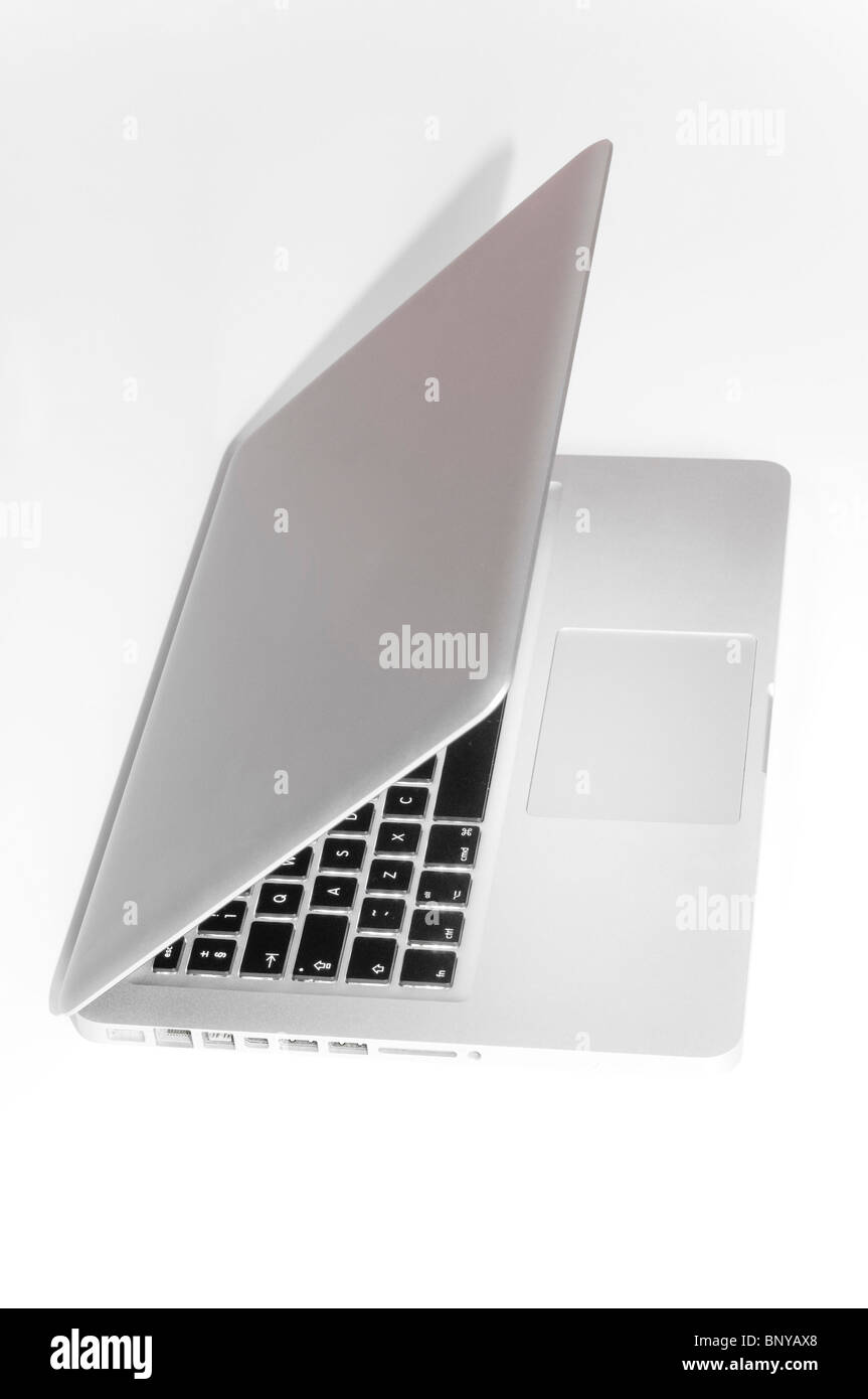 Silver laptop profile isolated on white background Stock Photo