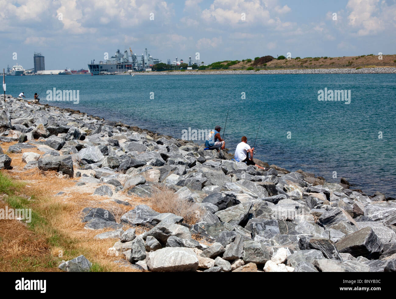 Fishing the channel at Port Canaveral on the Space Coast of Florida USA Stock Photo