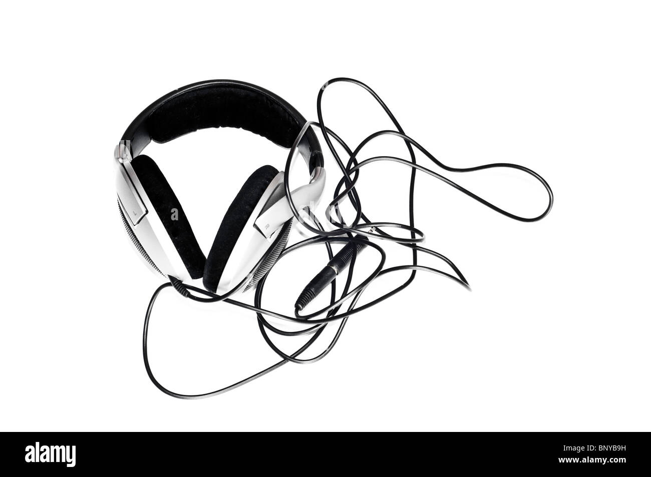 Silver headphones with long wire isolated on white background Stock