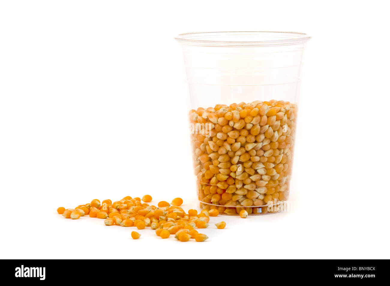 Cup made from corn with cord seeds over white background Stock Photo