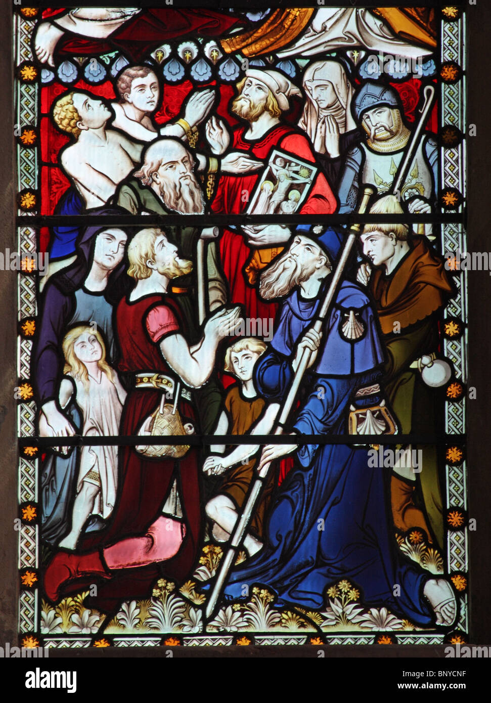 A stained glass window designed by John Hardman Powell depicting Apostles and Followers of Christ, All Saints Church, Ladbroke, Warwickshire Stock Photo