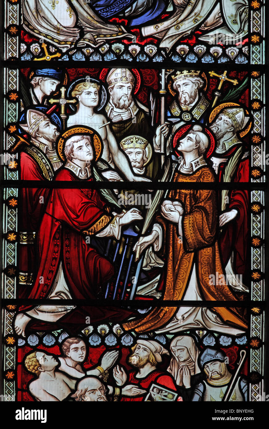 A stained glass window designed by John Hardman Powell depicting Kings, Martyrs and Bishops of England, All Saints Church, Ladbroke, Warwickshire Stock Photo