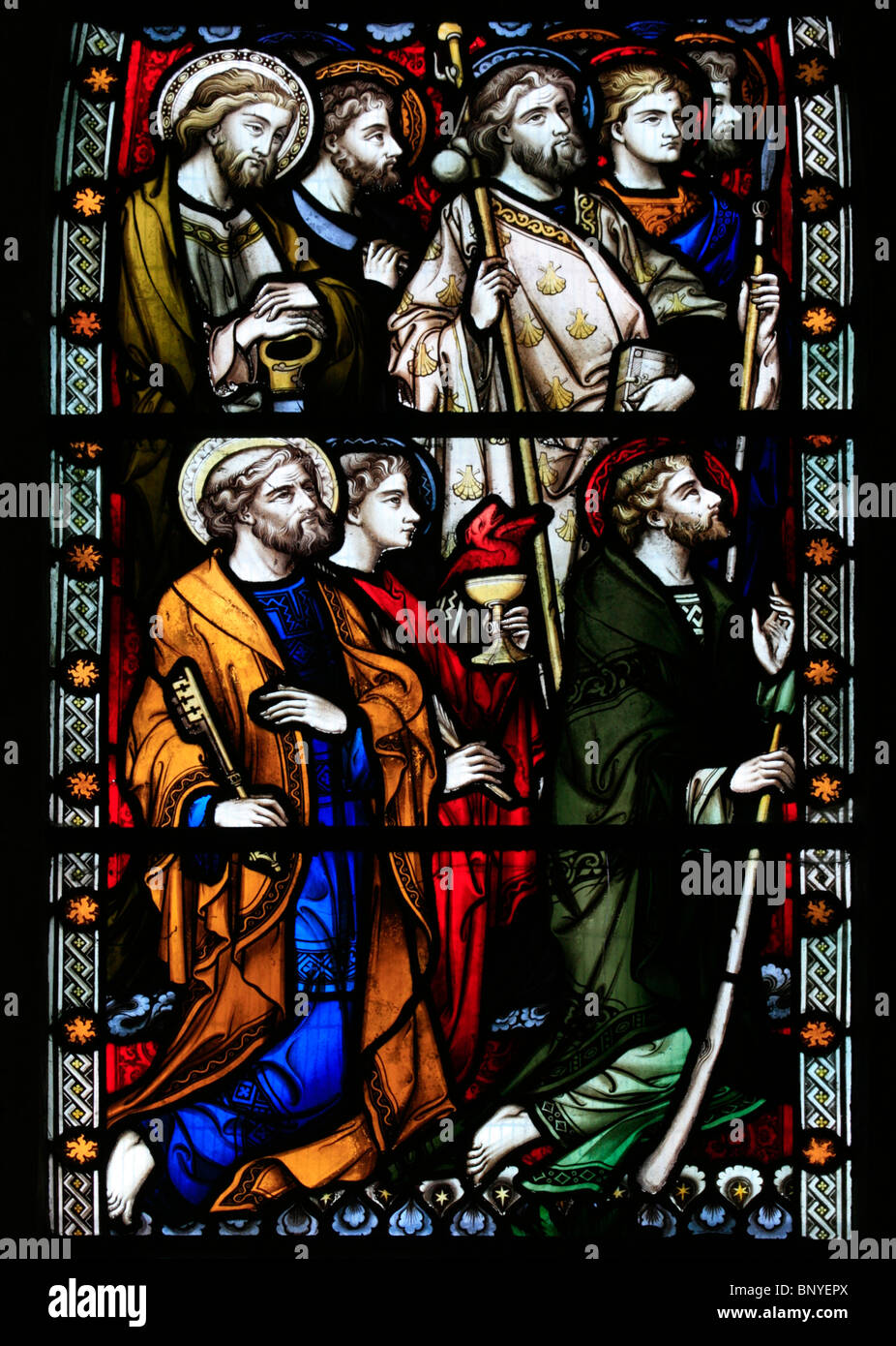 A stained glass window designed by John Hardman Powell depicting the Apostles, All Saints Church, Ladbroke, Warwickshire Stock Photo