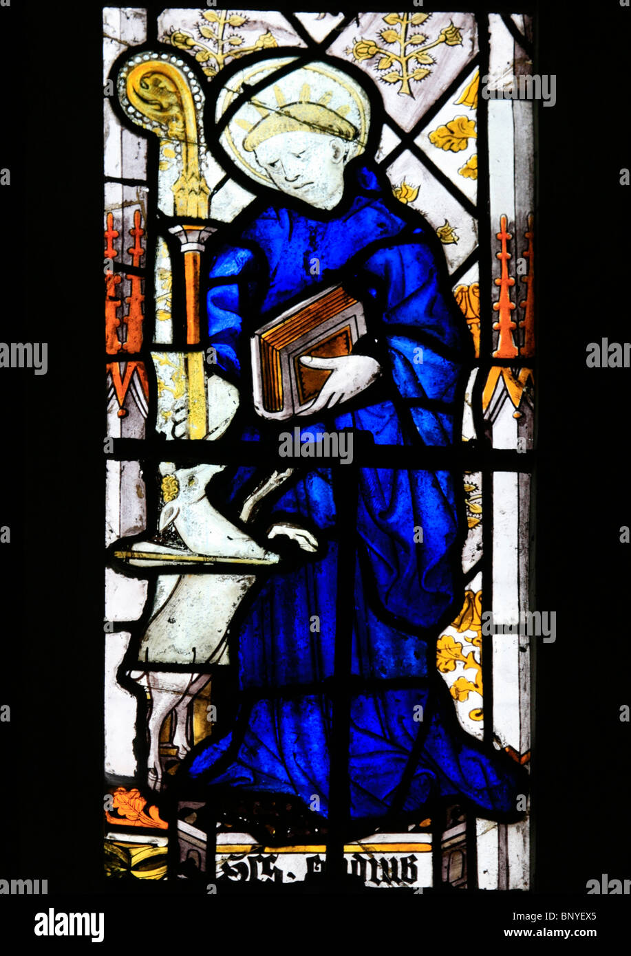 A 16th century stained glass window thought to have come from Germany depicting Saint Giles protecting the hind, All Saints Church, Ladbroke, Warks Stock Photo