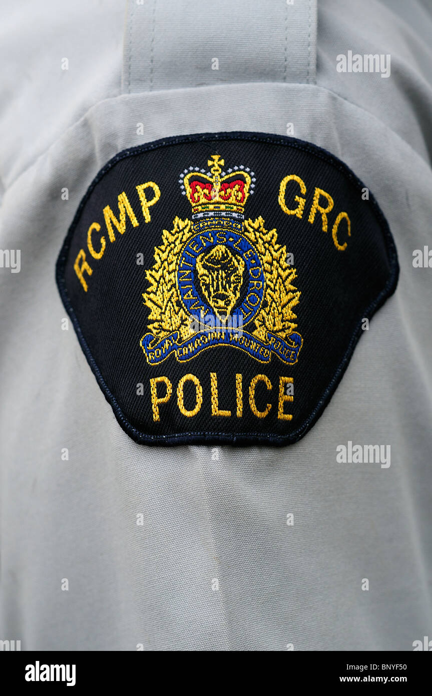 RCMP Summer Uniform Shoulder Badge On A Constables Shirt Stock Photo