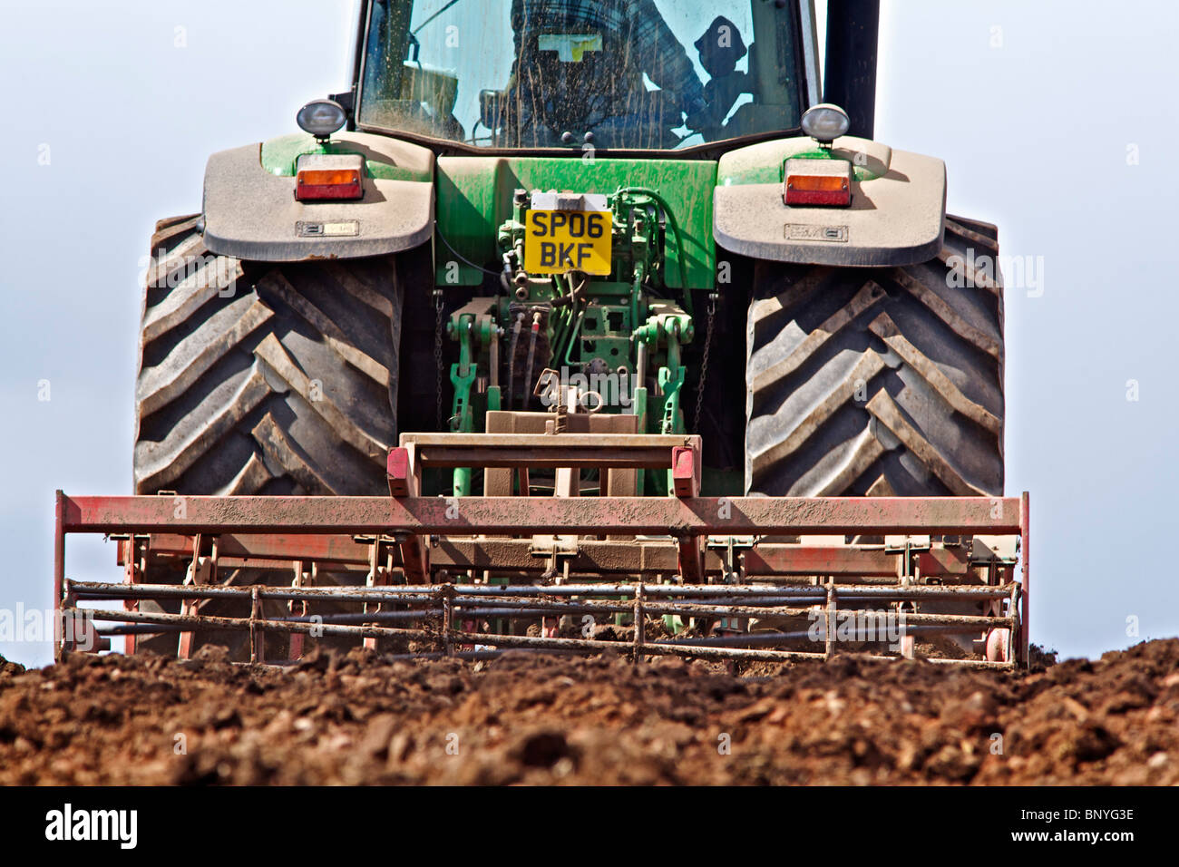John Deere tractor harrowing a field in Perthshire Stock Photo - Alamy