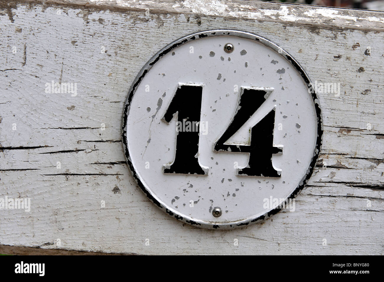 Number 14 on canal lock gate Stock Photo