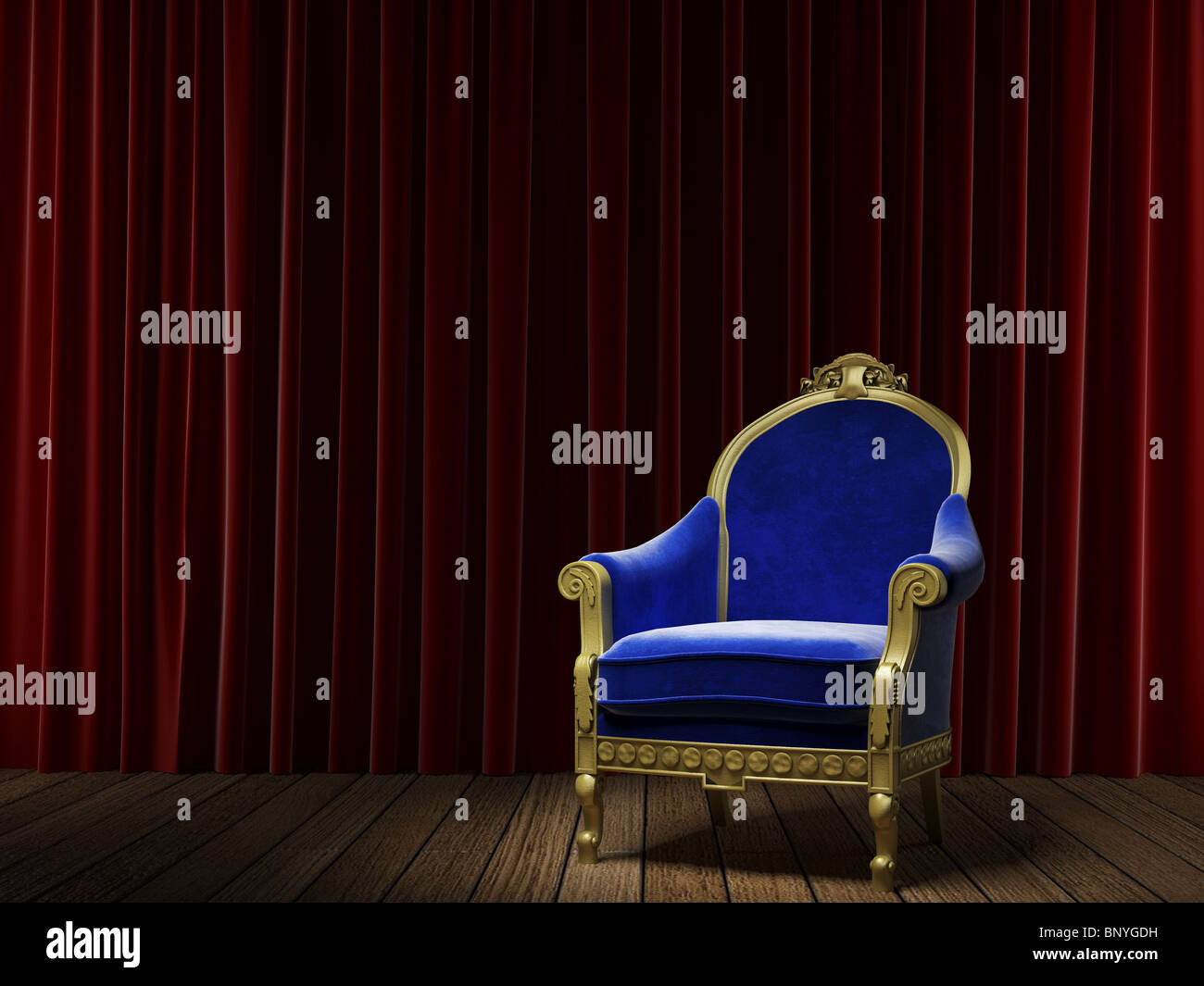 golden and blue armchair on a stage with a red velvet theater curtain as background Stock Photo