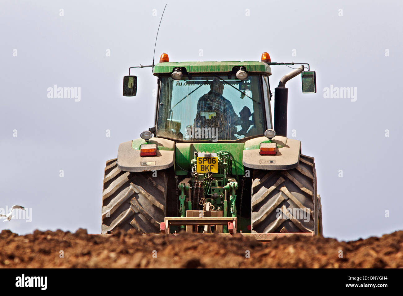 John Deere tractor harrowing a field in Perthshire Stock Photo - Alamy