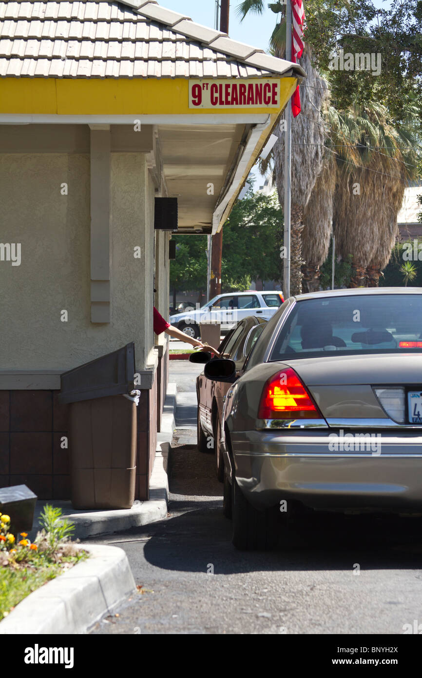 Getting fast food at a drive thru Stock Photo