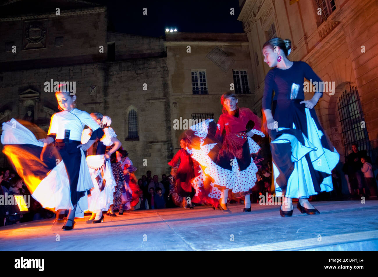 Arles, France, Feria 'Bullfighting Festival' Andalusian Women Performing on Stage Flamenco Dance in Costume, group teenagers  dancing outdoors people Stock Photo