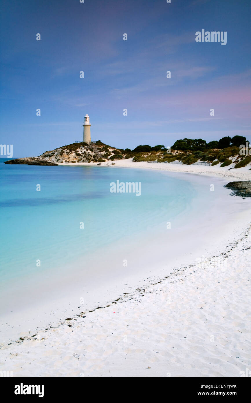 View along Pinky Beach to Bathurst lighthouse at dusk. Rottnest Island, Western Australia, AUSTRALIA. Stock Photo