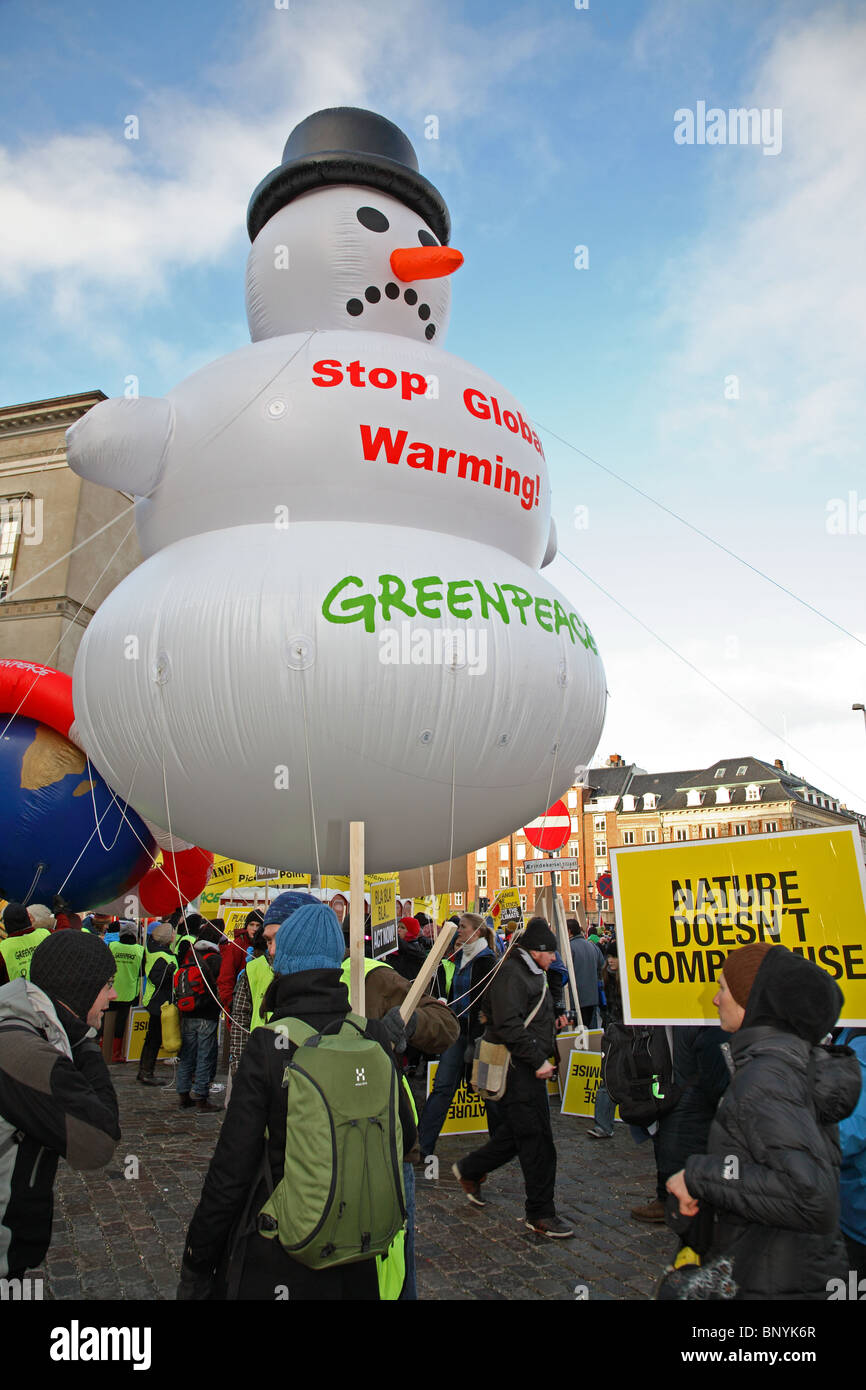 Greenpeace's melting snowman in front of the Parliament building in Copenhagen at the UN Climate Change Conference. Climate march. Stock Photo